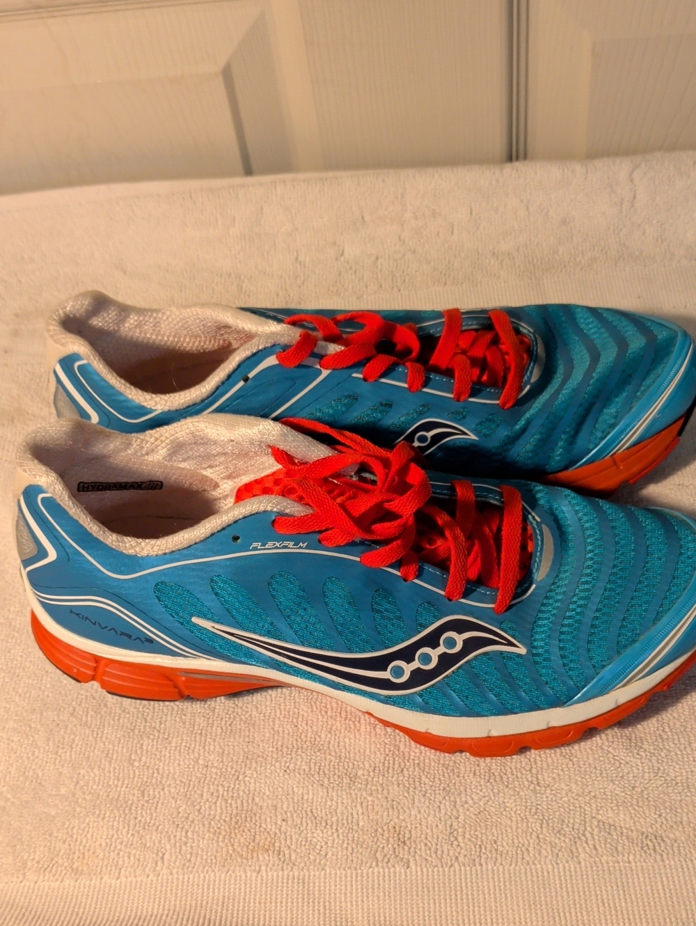 Saucony Women's Blue Athletic Shoes with Red Laces and Orange Soles